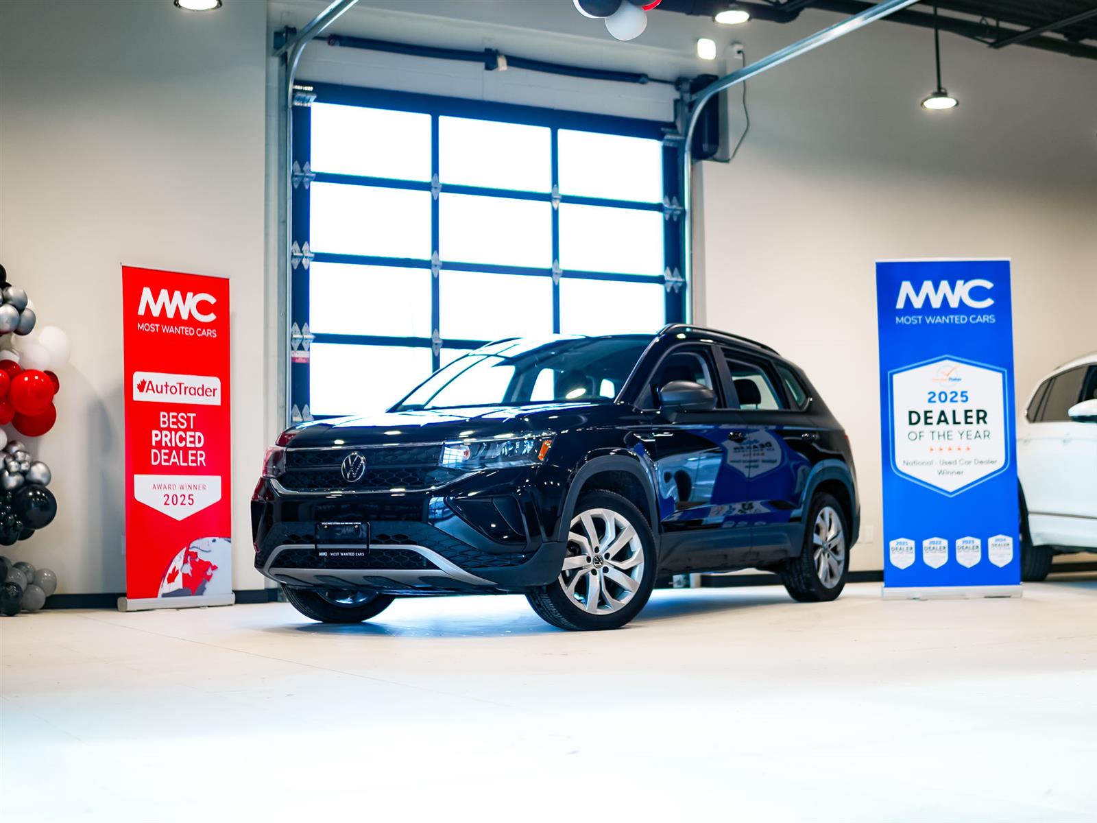 used 2023 Volkswagen Taos car, priced at $22,842