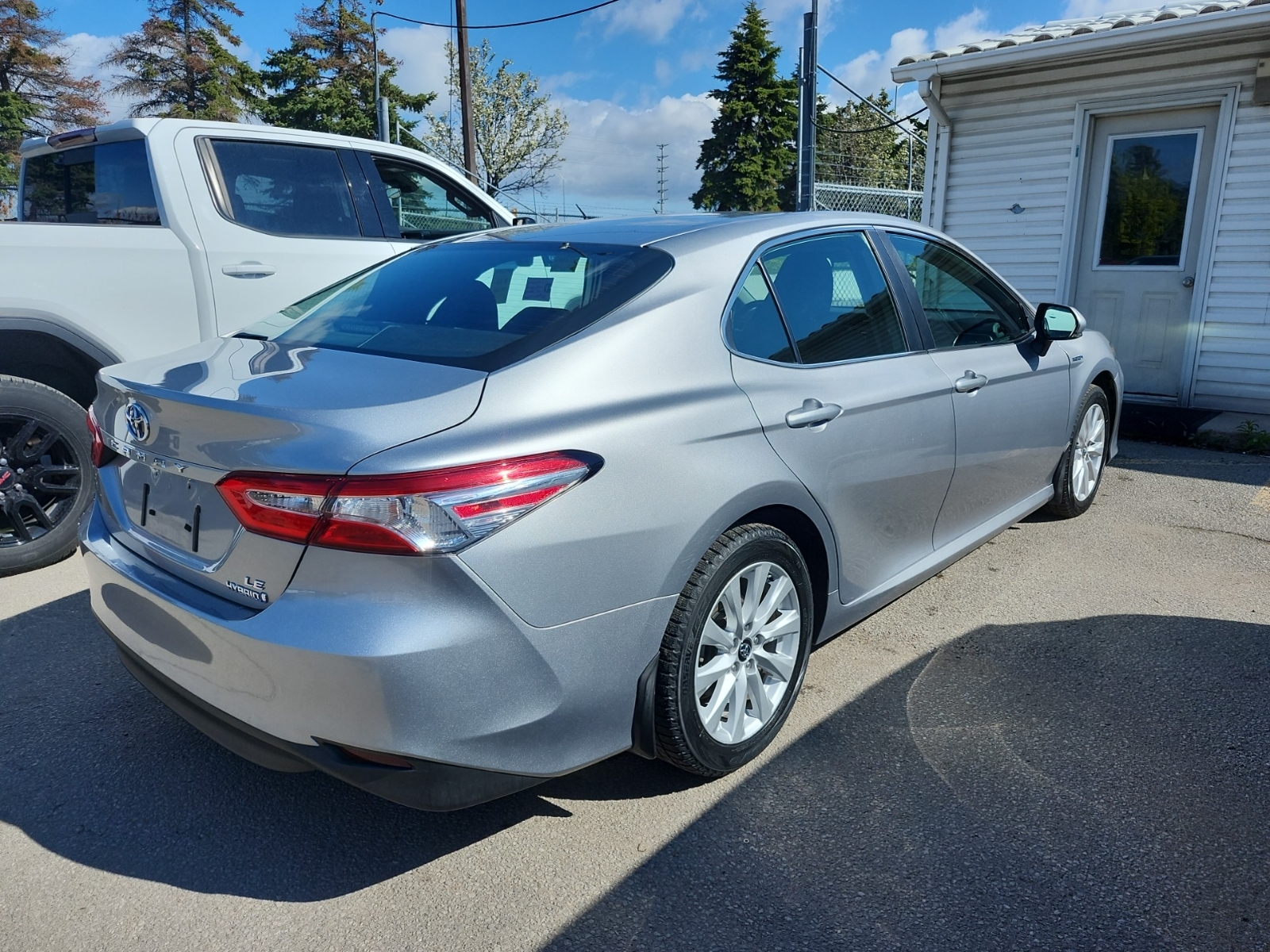 used 2019 Toyota Camry Hybrid car, priced at $24,962