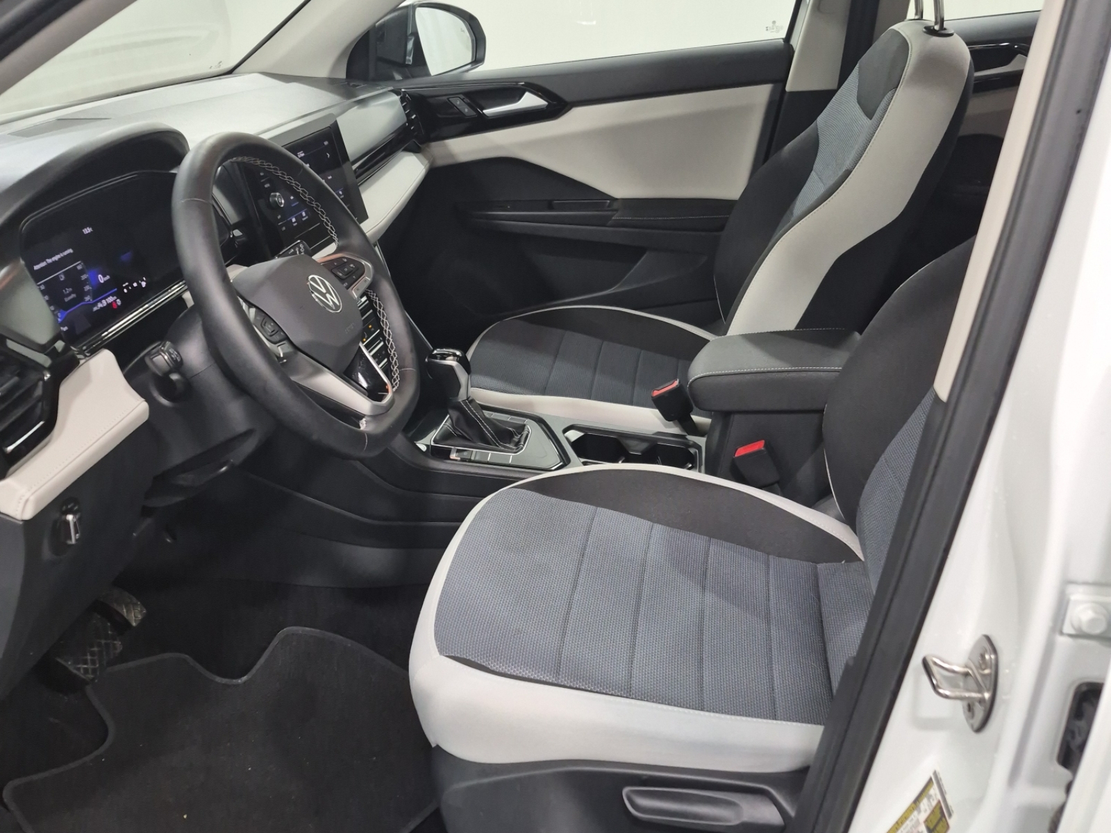 used 2025 Volkswagen Taos car, priced at $28,462