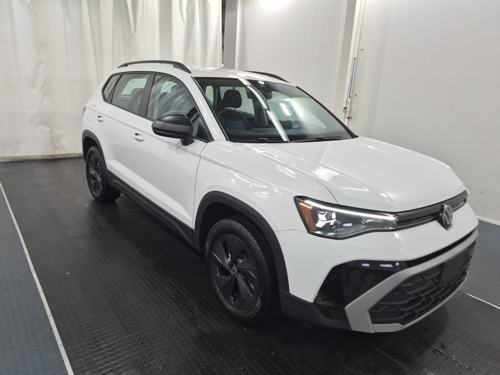 used 2025 Volkswagen Taos car, priced at $28,462