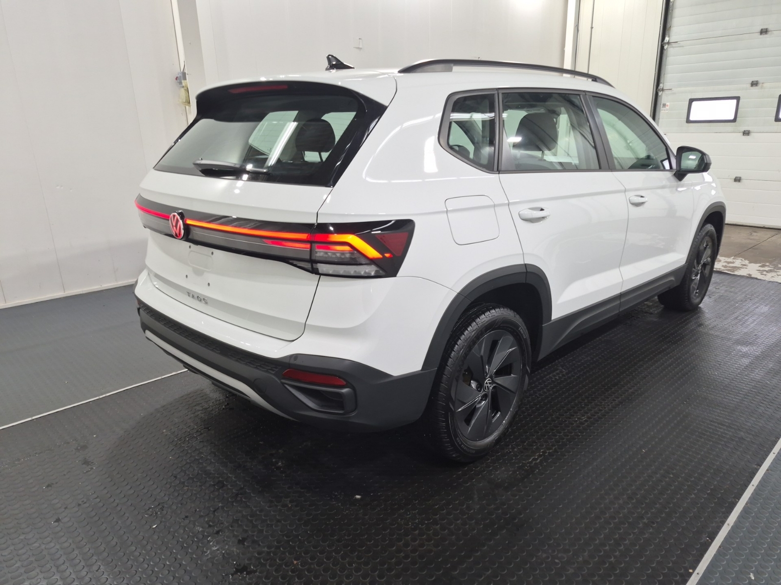 used 2025 Volkswagen Taos car, priced at $28,462