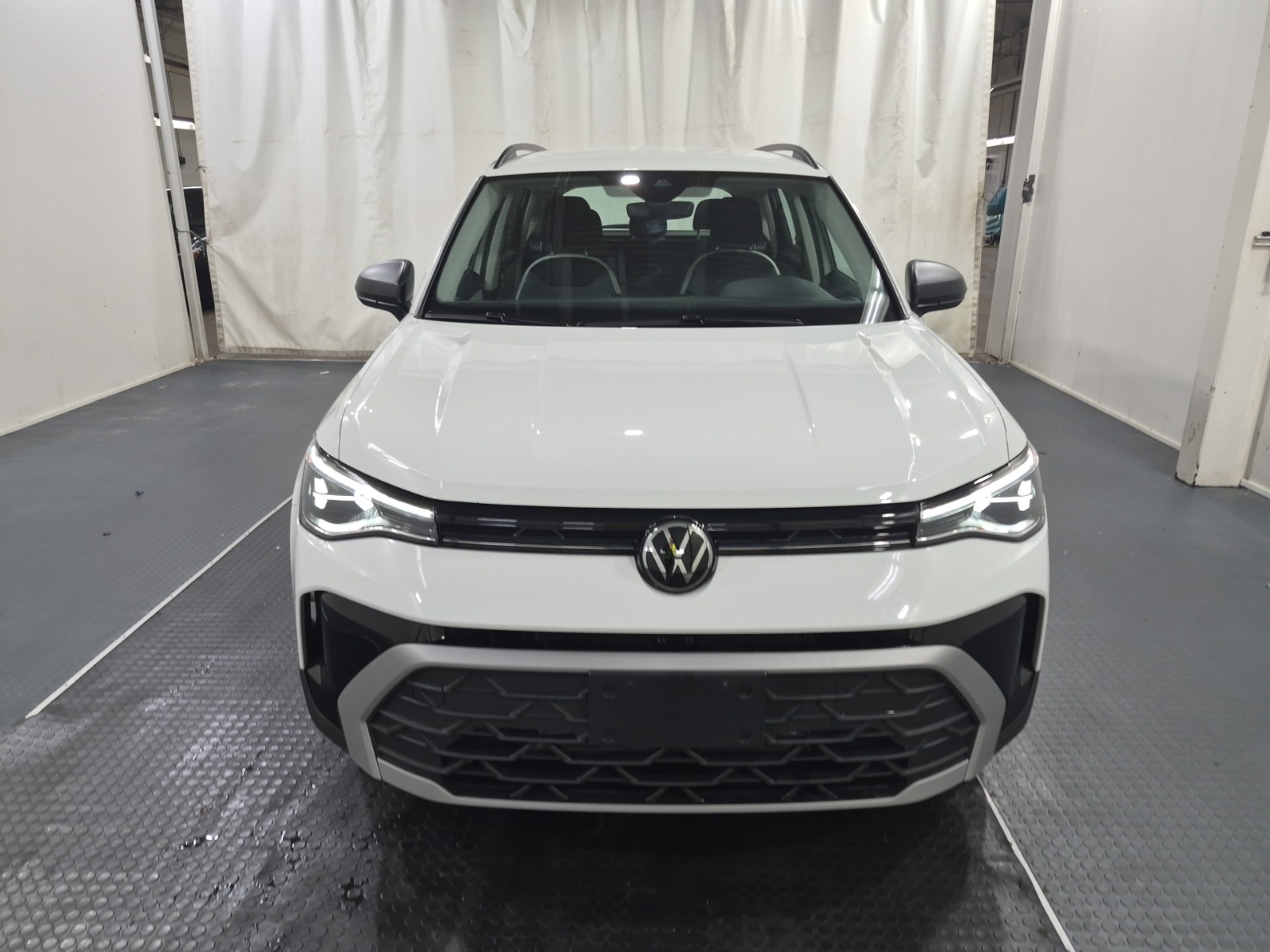 used 2025 Volkswagen Taos car, priced at $28,462