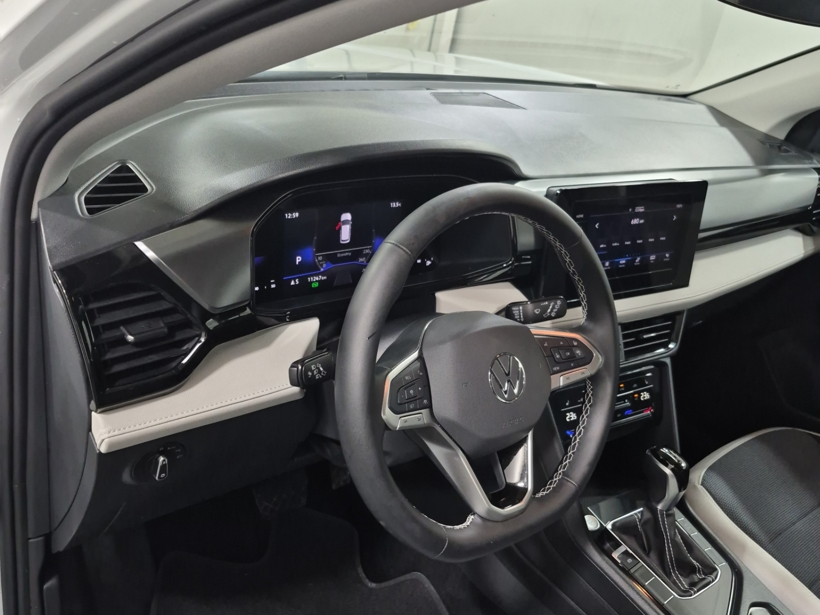 used 2025 Volkswagen Taos car, priced at $28,462