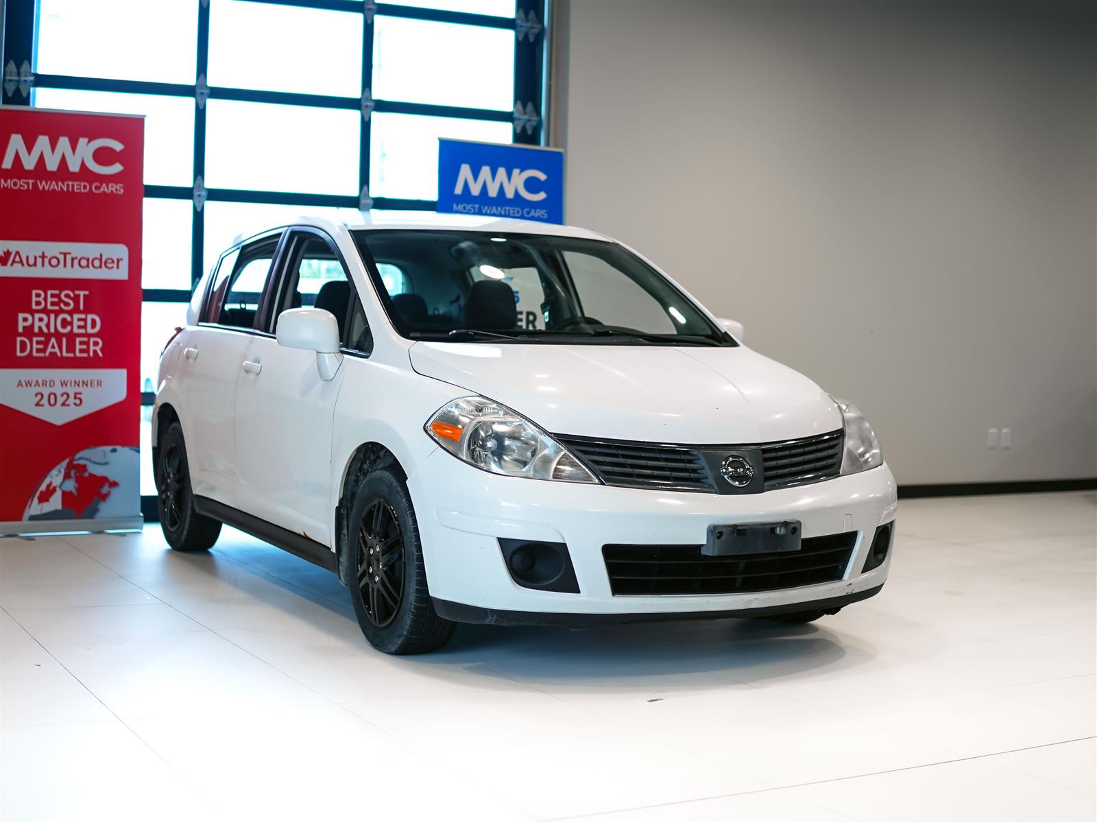 used 2009 Nissan Versa car, priced at $1,491