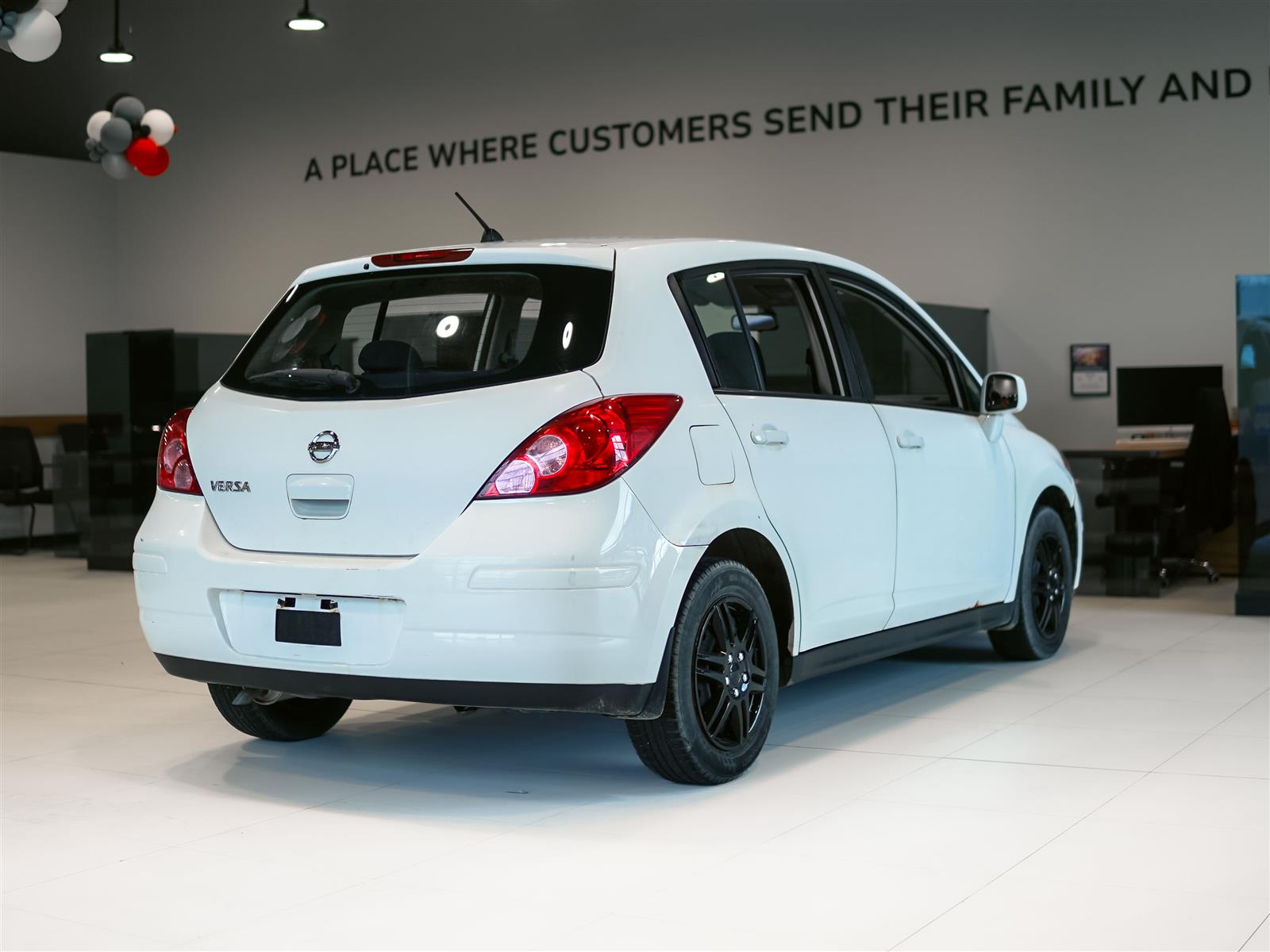 used 2009 Nissan Versa car, priced at $1,491