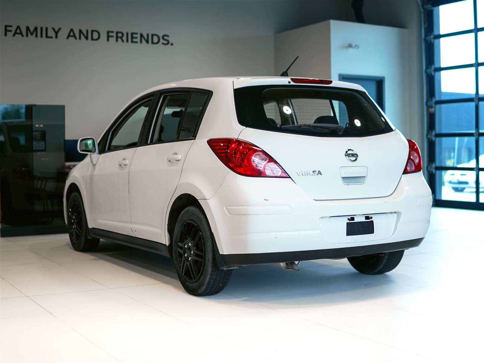 used 2009 Nissan Versa car, priced at $1,491