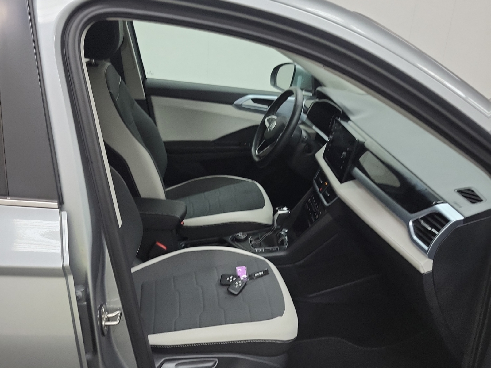 used 2025 Volkswagen Taos car, priced at $30,463