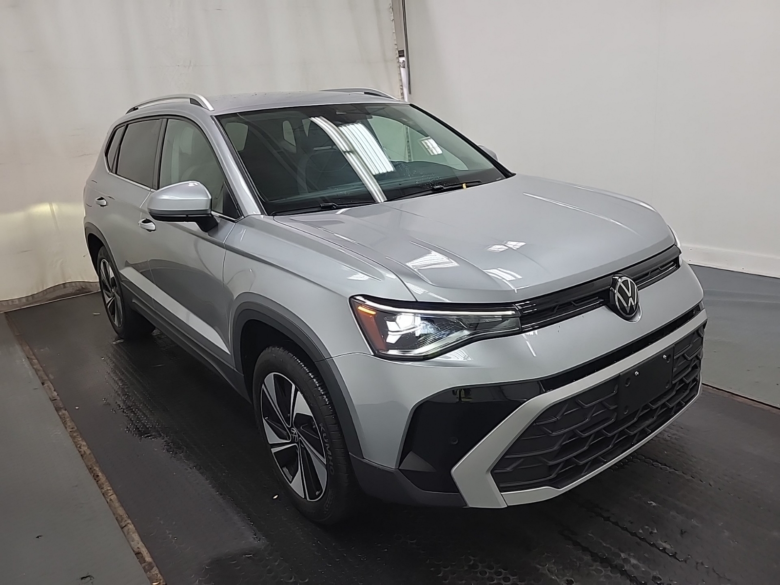used 2025 Volkswagen Taos car, priced at $30,463