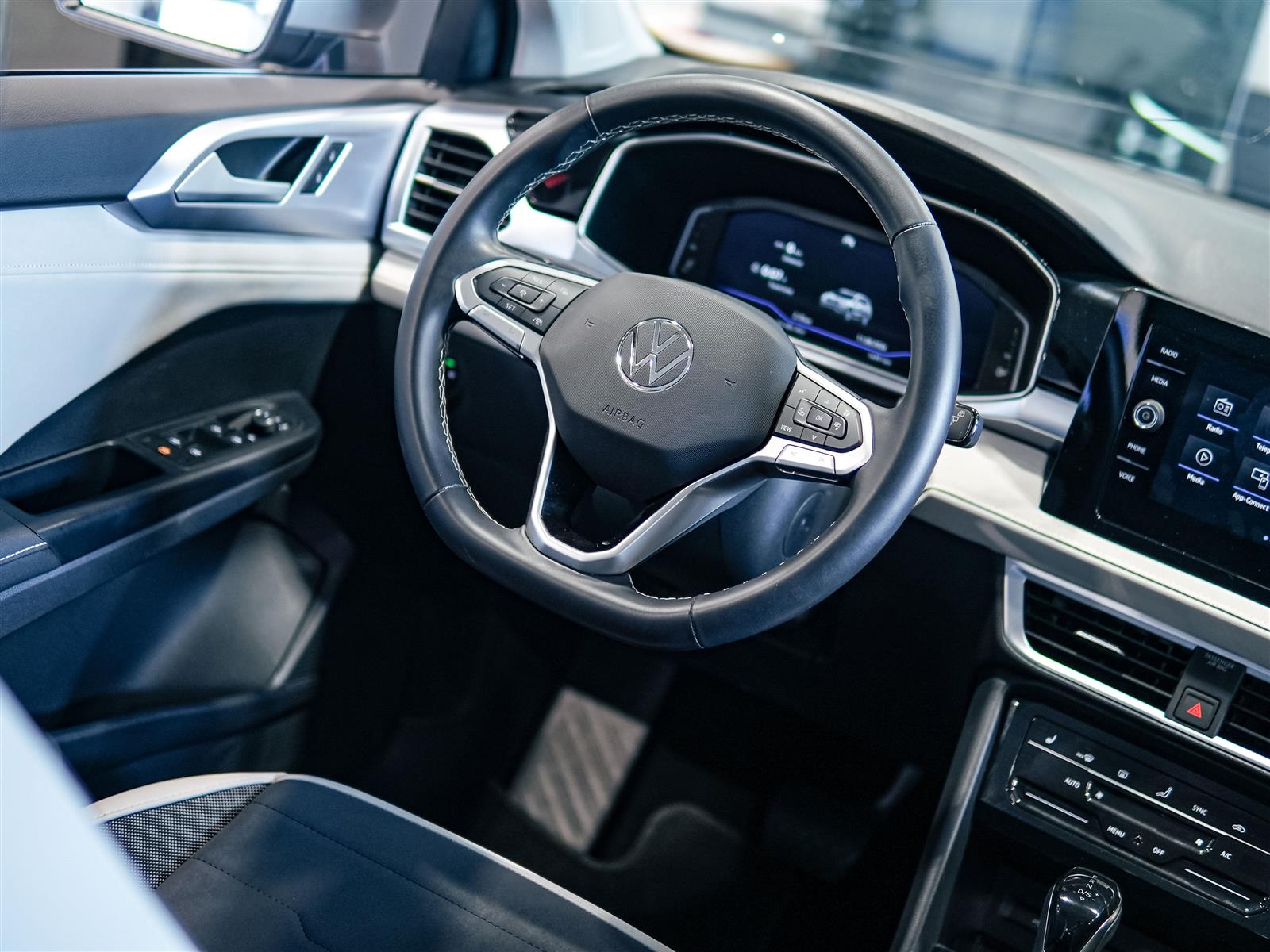 used 2025 Volkswagen Taos car, priced at $30,463