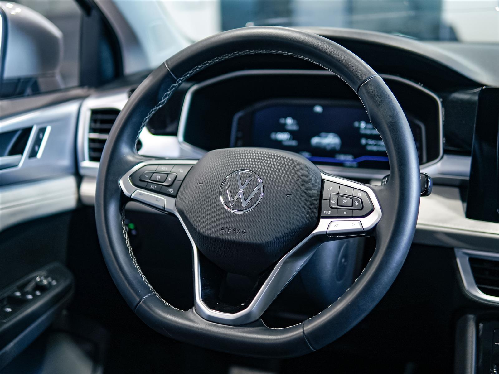 used 2025 Volkswagen Taos car, priced at $30,463