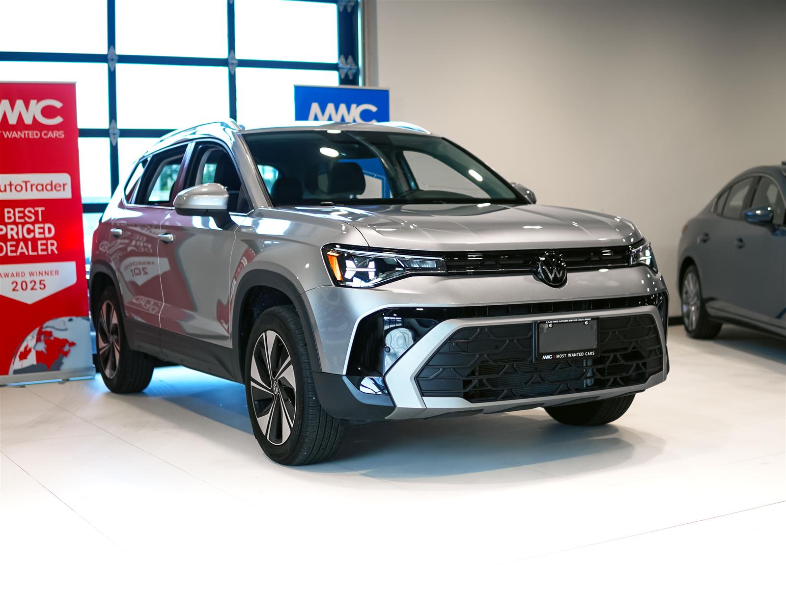 used 2025 Volkswagen Taos car, priced at $30,463