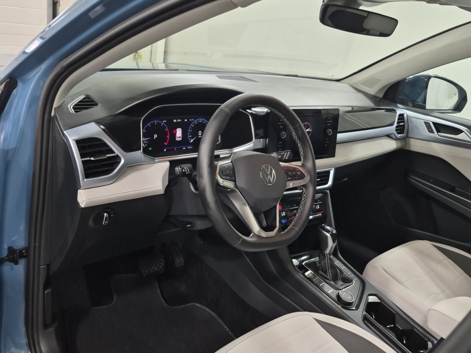 used 2025 Volkswagen Taos car, priced at $31,462