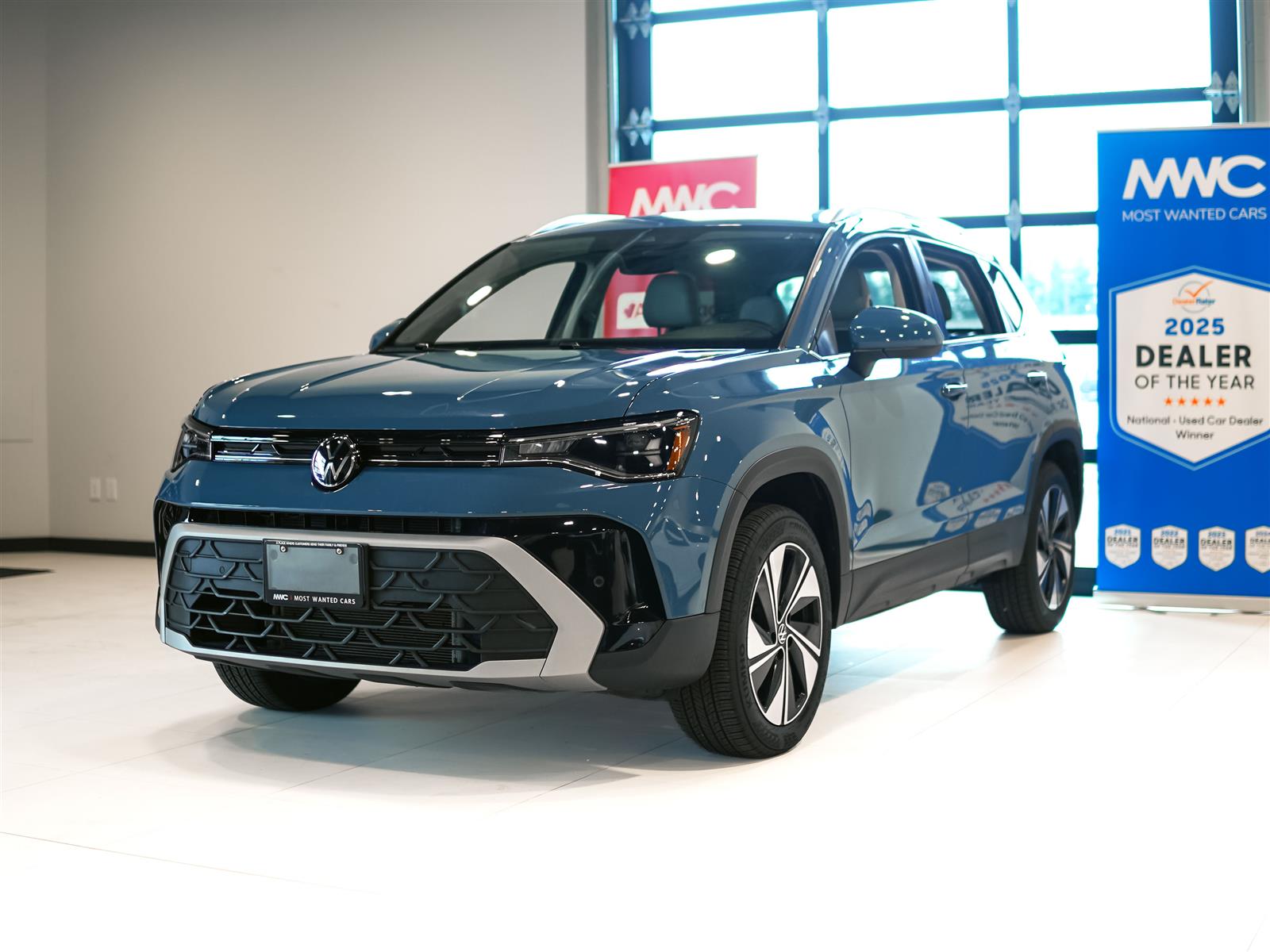 used 2025 Volkswagen Taos car, priced at $30,962