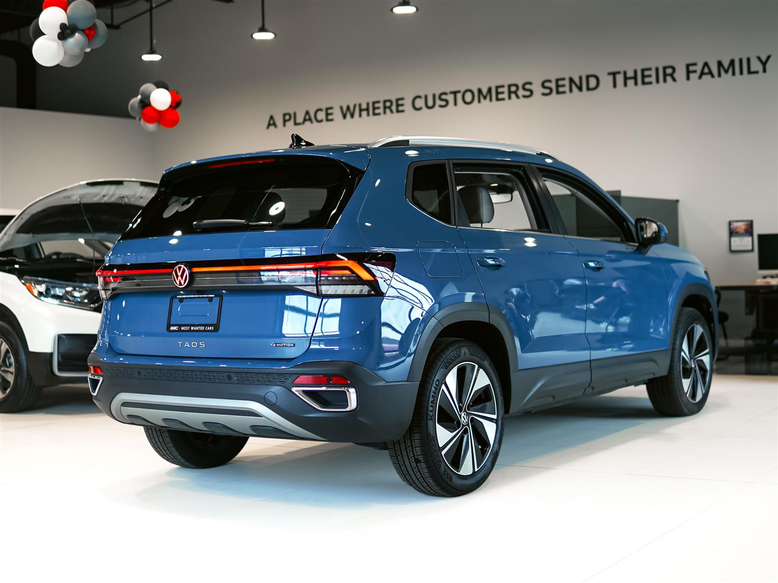 used 2025 Volkswagen Taos car, priced at $30,962