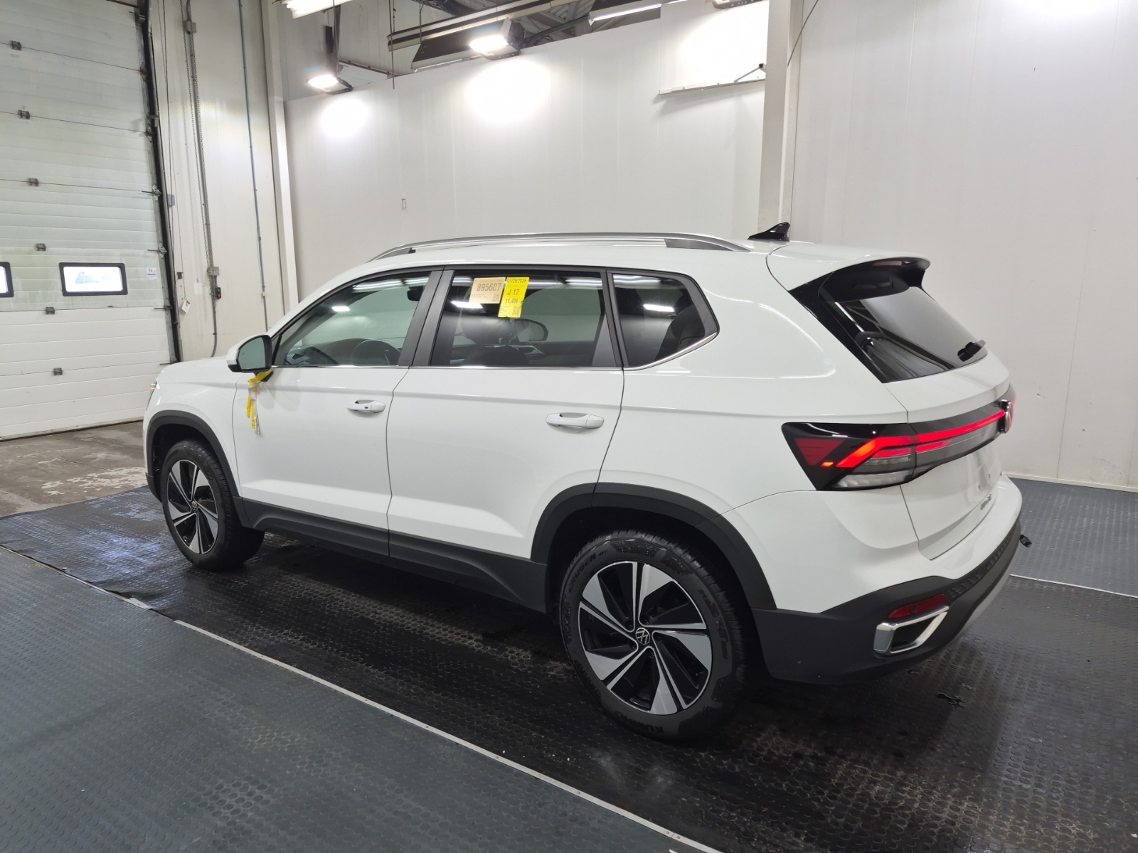 used 2025 Volkswagen Taos car, priced at $30,962