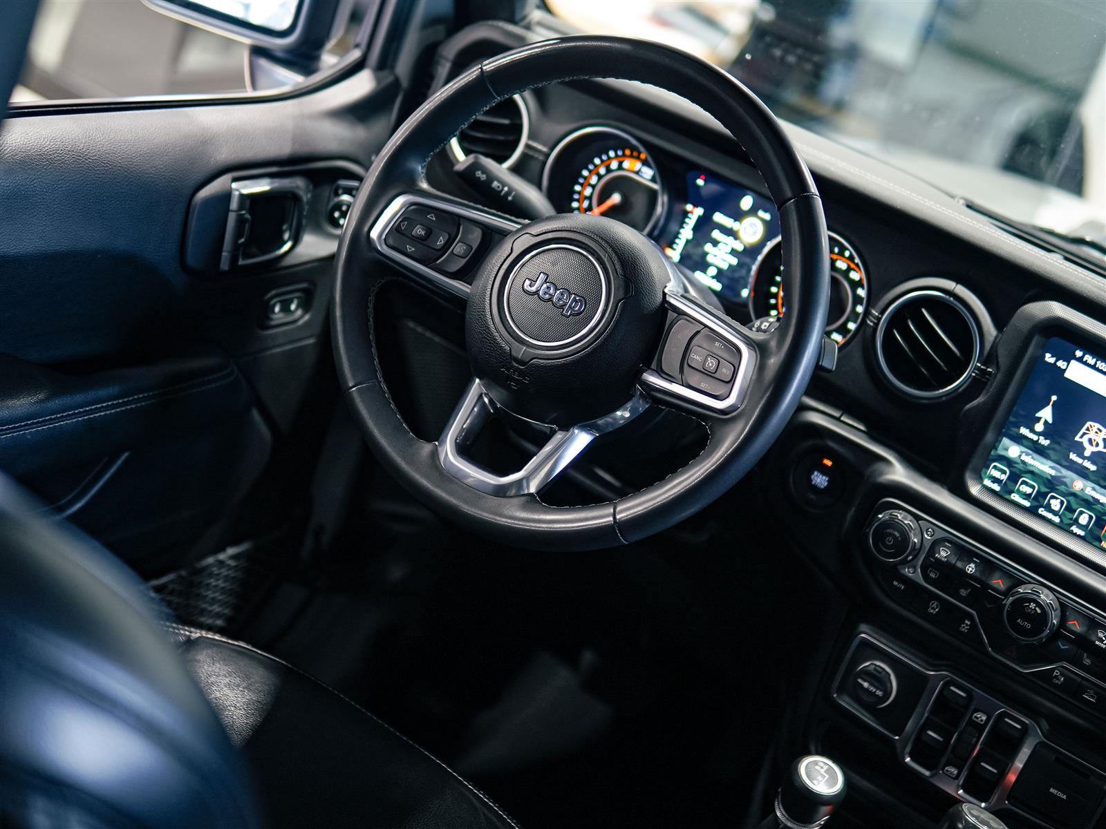used 2023 Jeep Wrangler car, priced at $34,394
