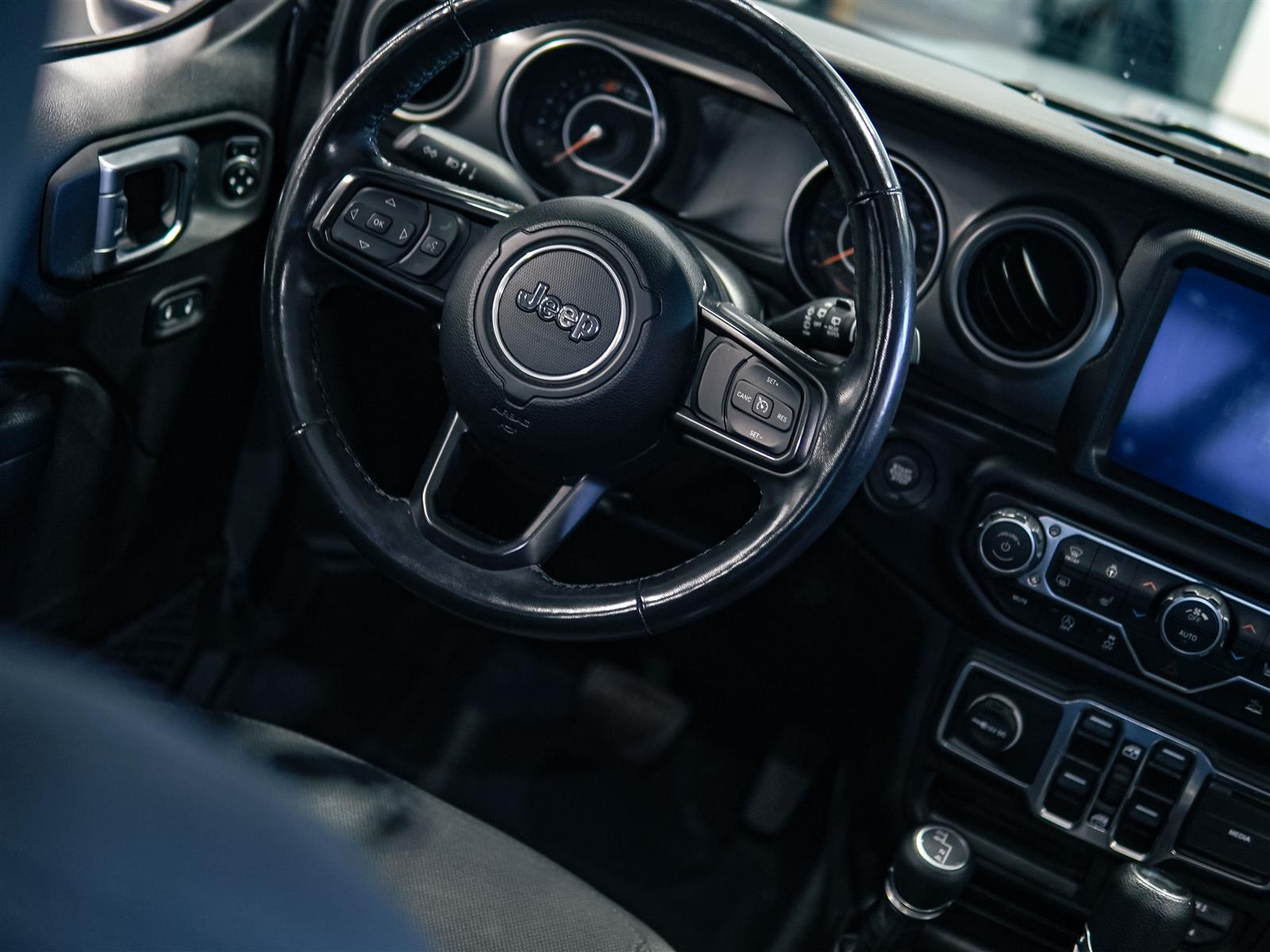 used 2023 Jeep Wrangler car, priced at $36,984