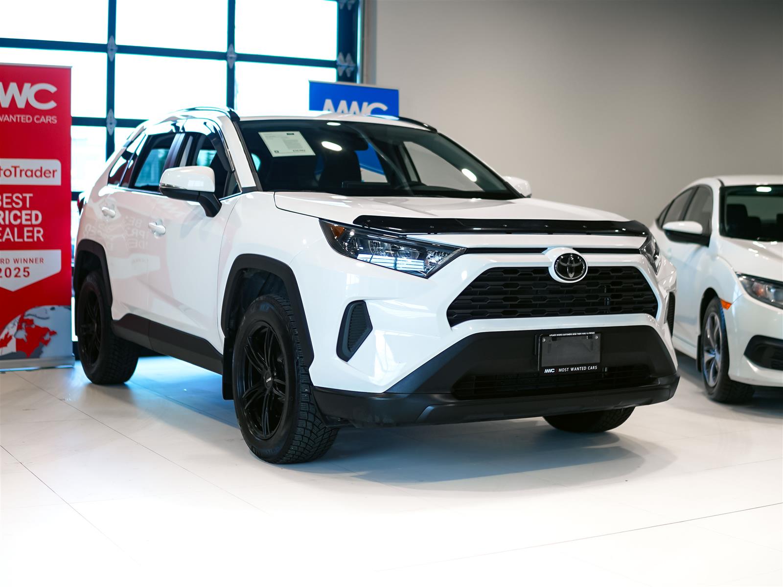 used 2021 Toyota RAV4 car, priced at $27,352