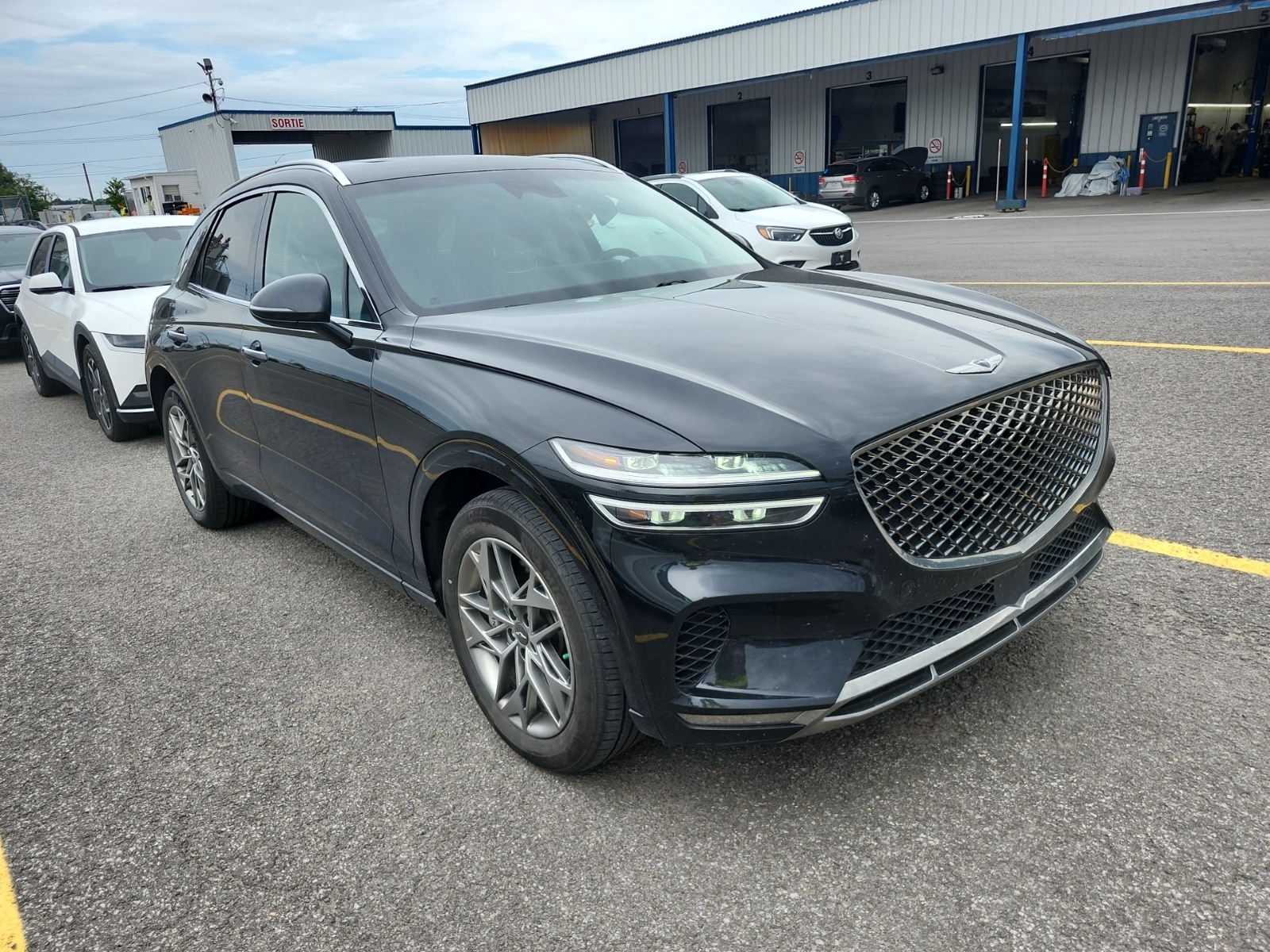 used 2023 Genesis GV70 car, priced at $39,994