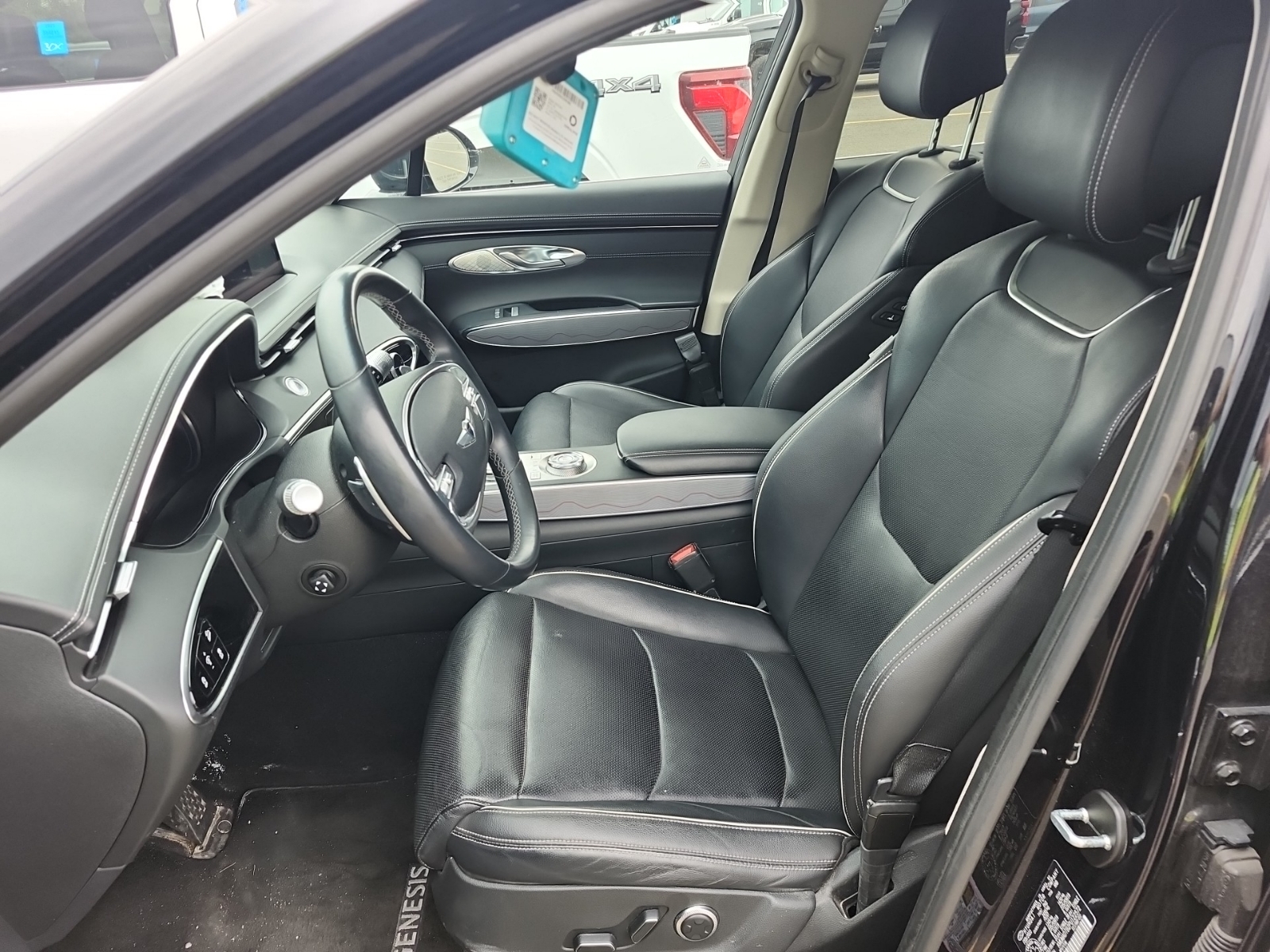 used 2023 Genesis GV70 car, priced at $39,994