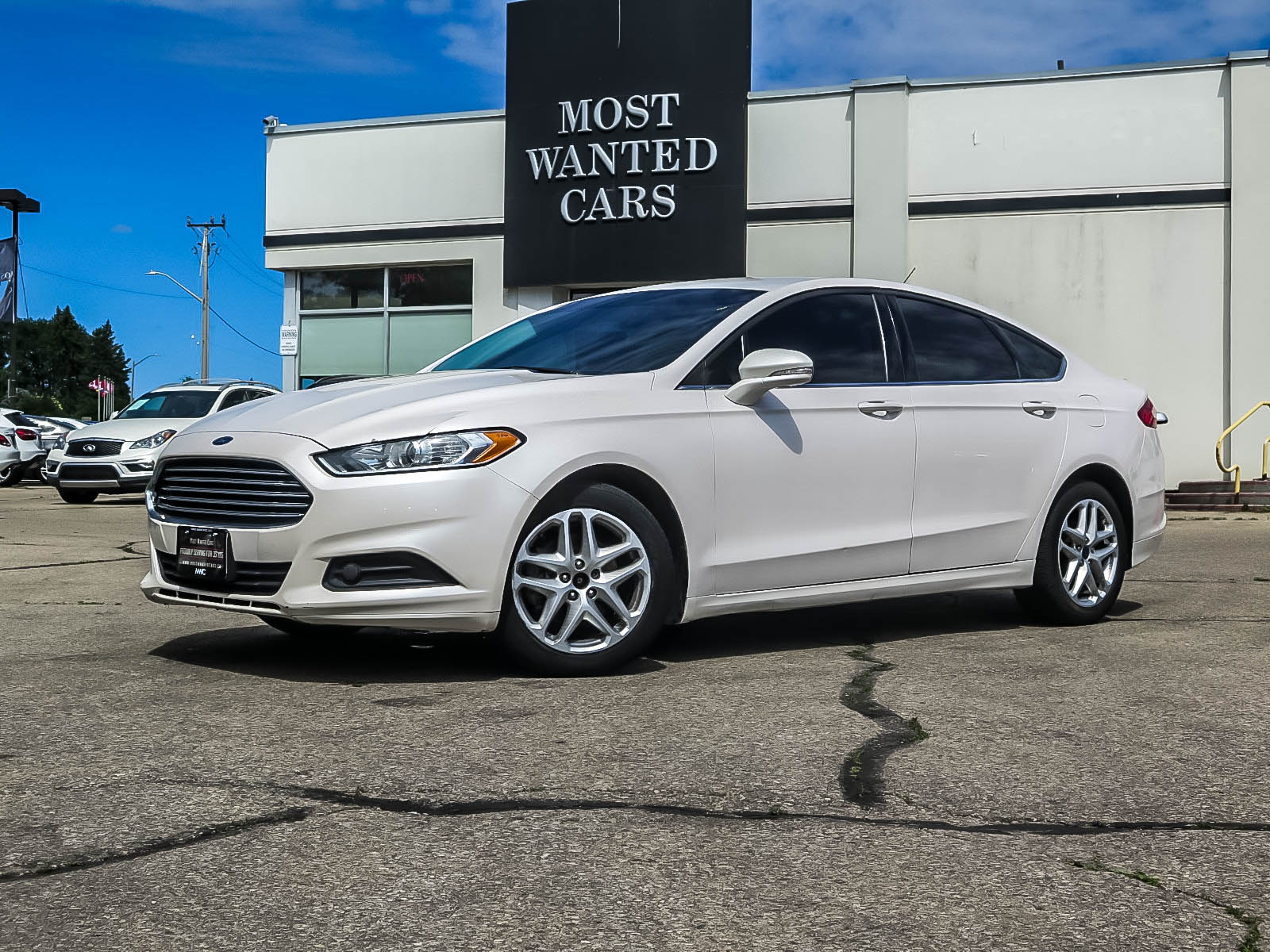 used 2016 Ford Fusion car, priced at $12,935